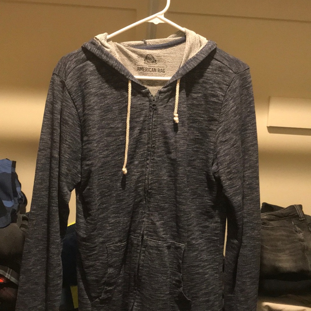 Navy blue zip-down jacket with a hoodie
